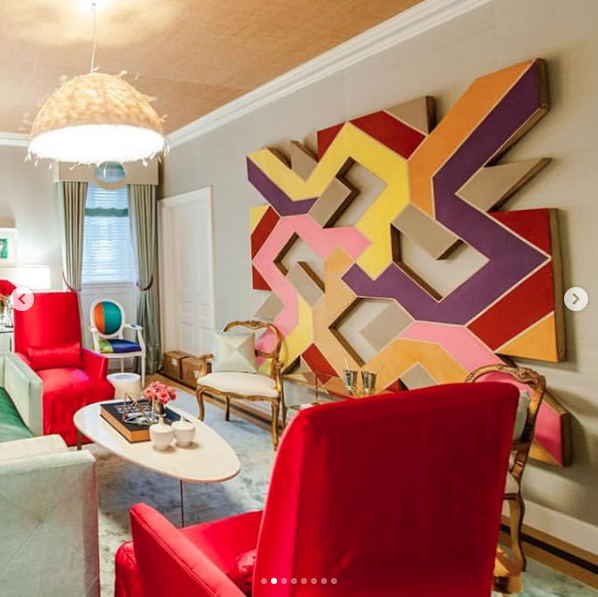 photo of New York City interior designer Patrick Hamilton's room at the Holiday House showroom featuring a large scale abstract shaped canvas painting sourced by Heather Karlie Vieira of HKFA