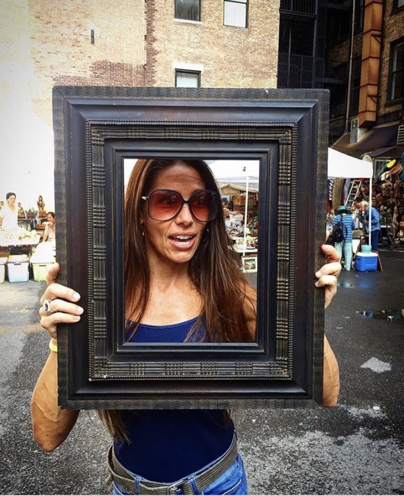 heather karlie vieira of hkfa at the chelsea flea market in new york city with a dutch style antique picture frame