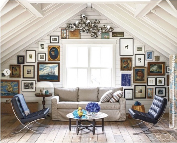 interior scene from elle decor magazine featuring antique picture frames