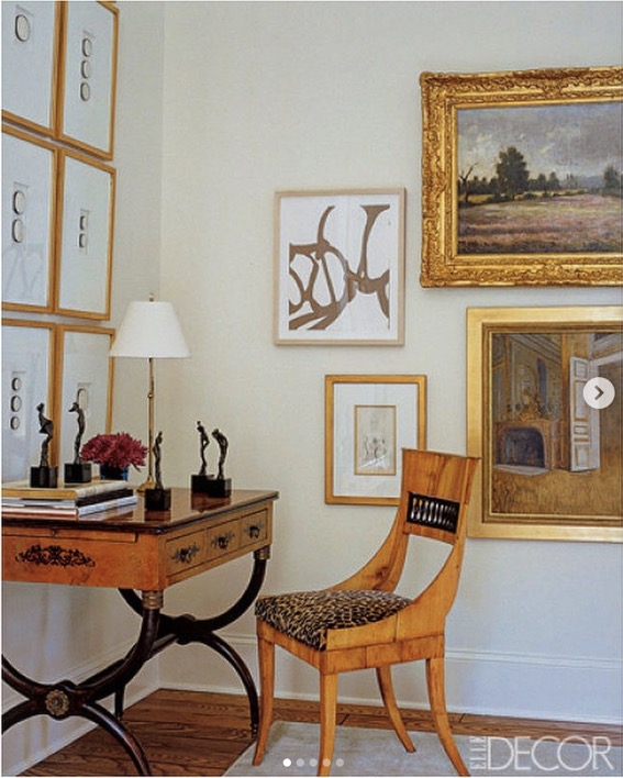 photo from elle decor featuring antique picture frames