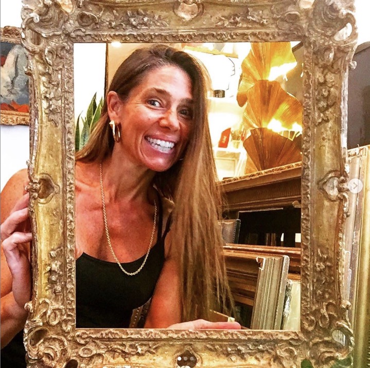 heather karlie vieira of hkfa with an antique picture frame